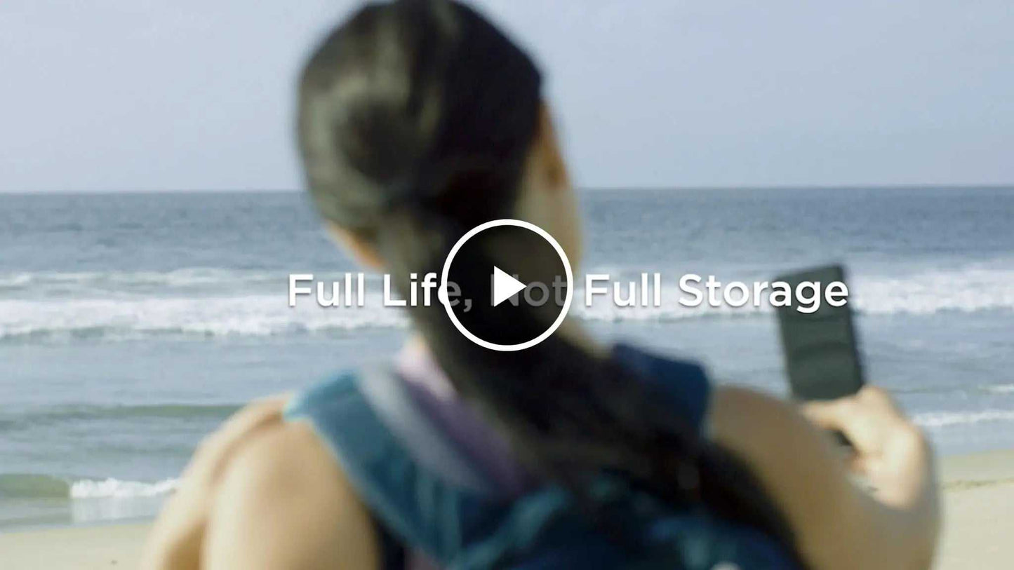 SanDisk Ultra Dual Drive Go USB Type-C Flash Drive by the beach, emphasizing storage convenience.
