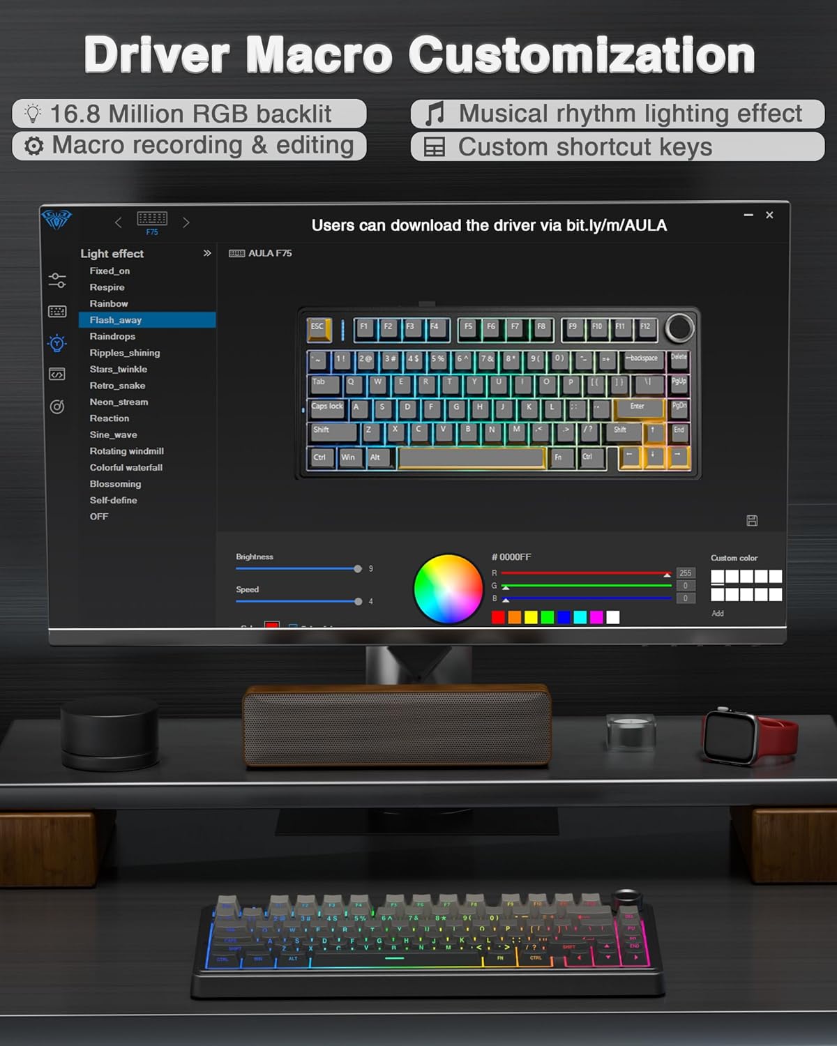 Computer monitor displaying driver macro customization software with a keyboard in front