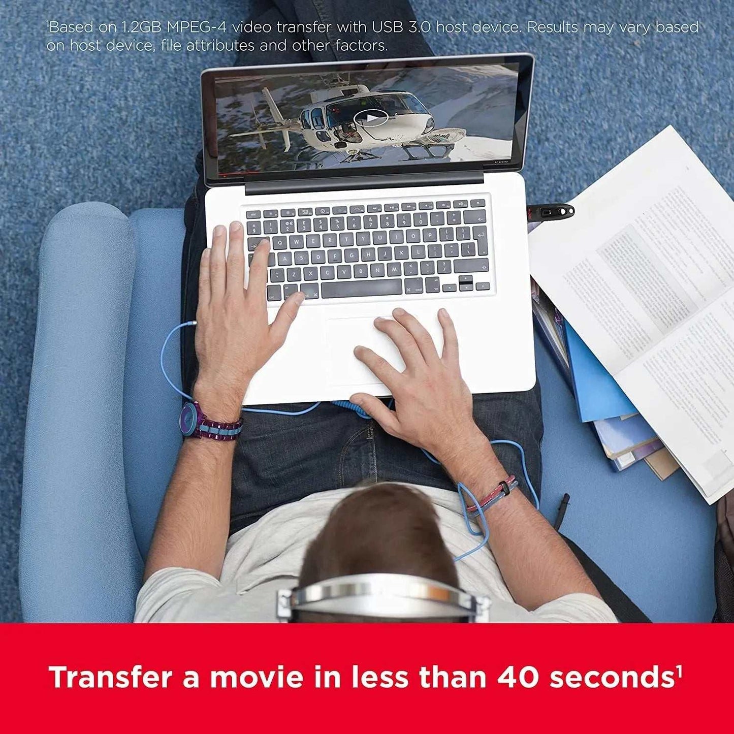 Person transferring a movie quickly on a laptop using SanDisk Ultra USB 3.0 Flash Drive.
