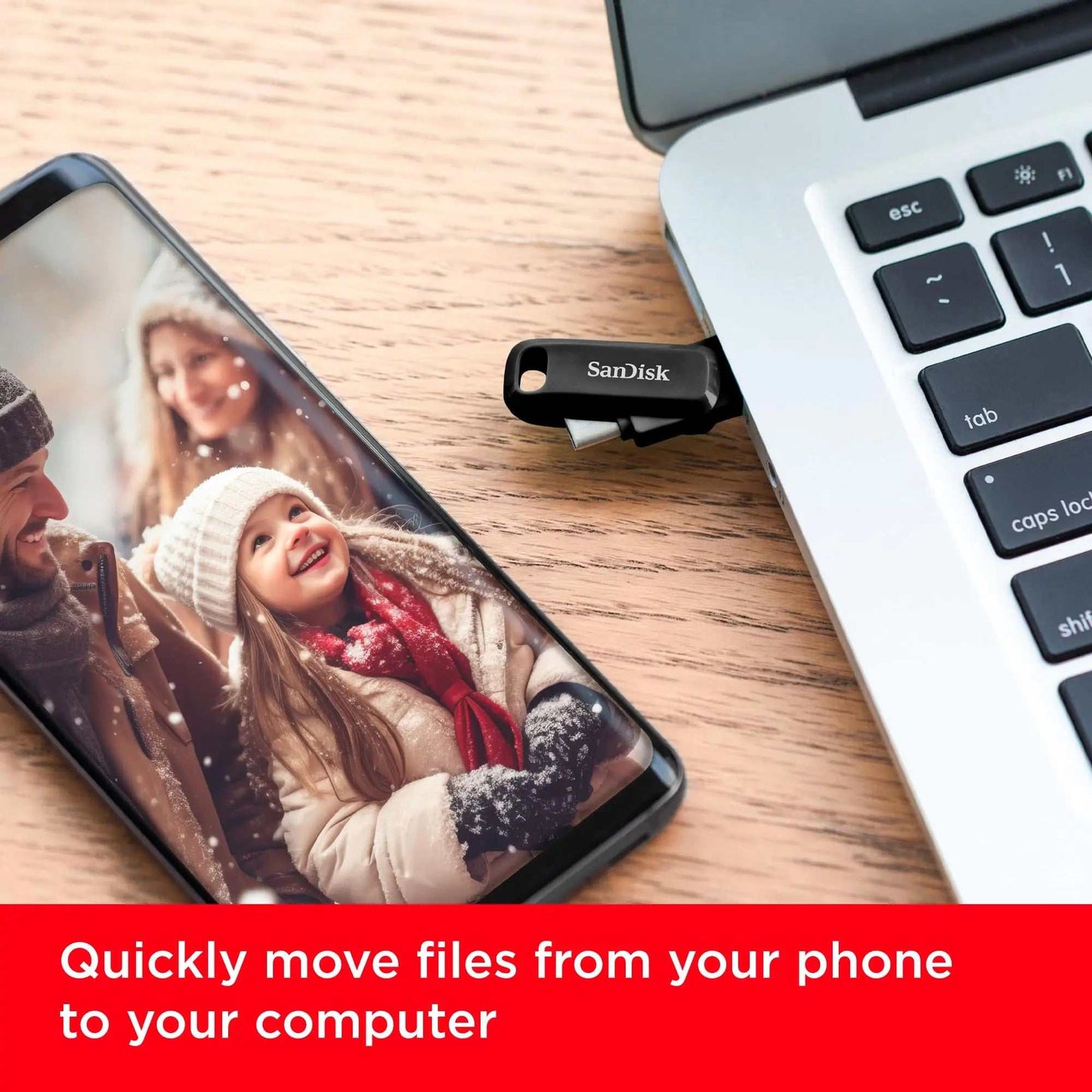 SanDisk Ultra Dual Drive Go USB Type-C flash drive connected to smartphone and laptop for fast file transfer.