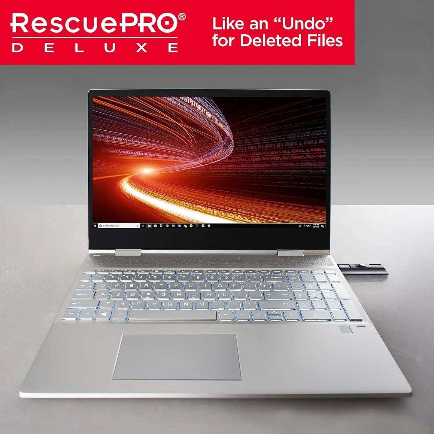 SanDisk Extreme PRO USB 3.2 flash drive connected to a laptop, featuring RescuePRO Deluxe software.