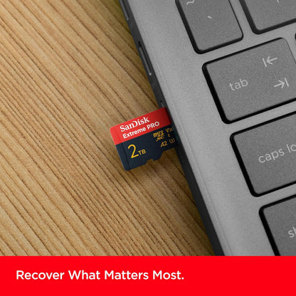 Extreme PRO 2TB microSDXC – card beside a laptop keyboard